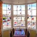 H157 Dining Rm View w flags